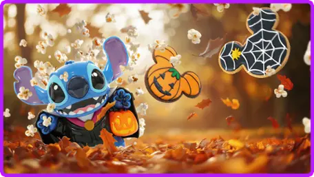 Stitch in a vampire cape with Mickey pumpkin snacks and autumn leaves