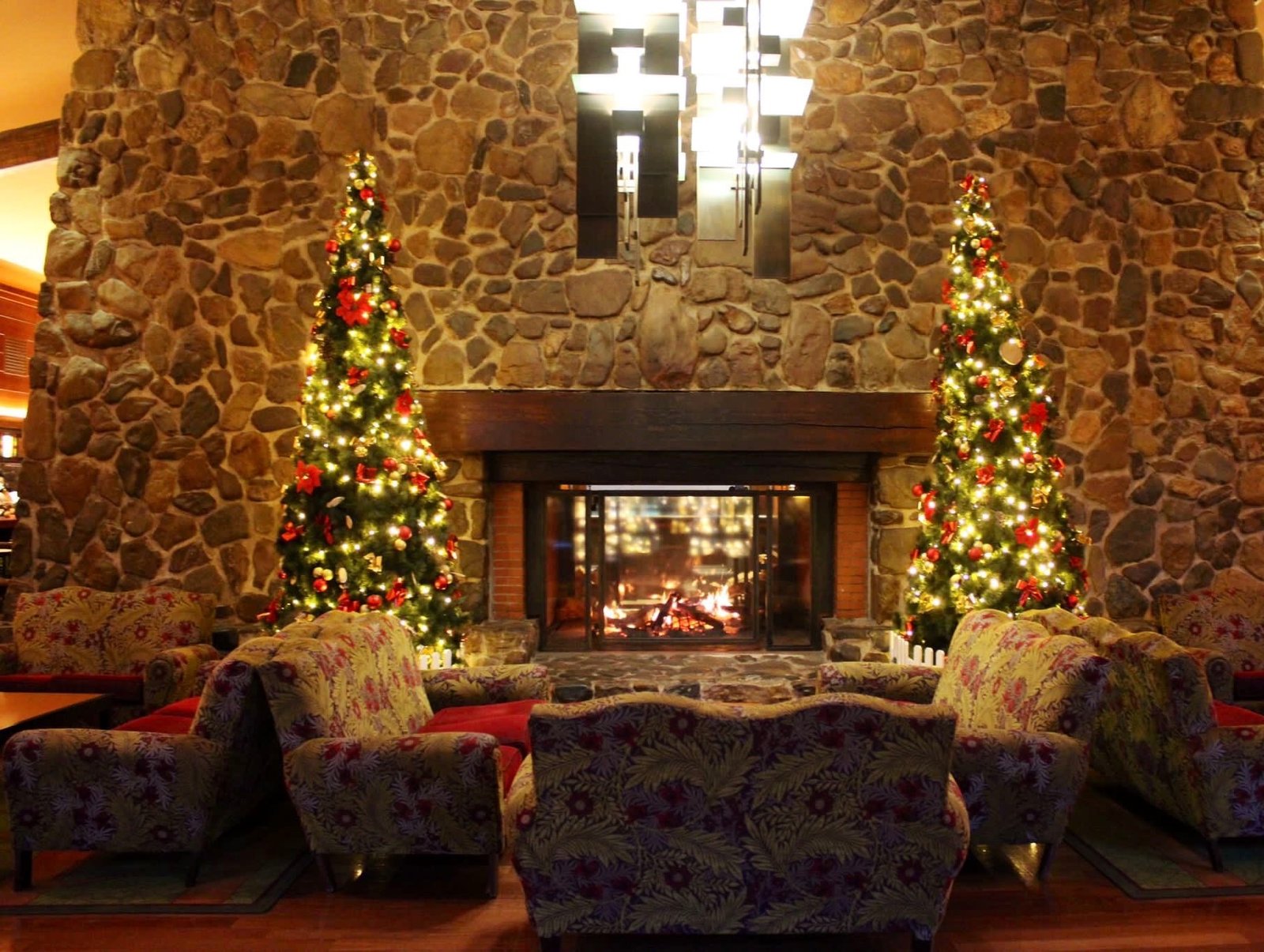 Fireplace inside Disney Sequoia Lodge decorated for Christmas